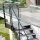 Escalier extérieur Astra avec palier et rampe:  Ø 4 mm cables, 68 - 80cm (4 marches + palier), 2 supports muraux, grillage soudée